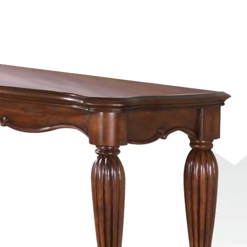 Table de canapé en bois avec détails sculptés, brun cerise